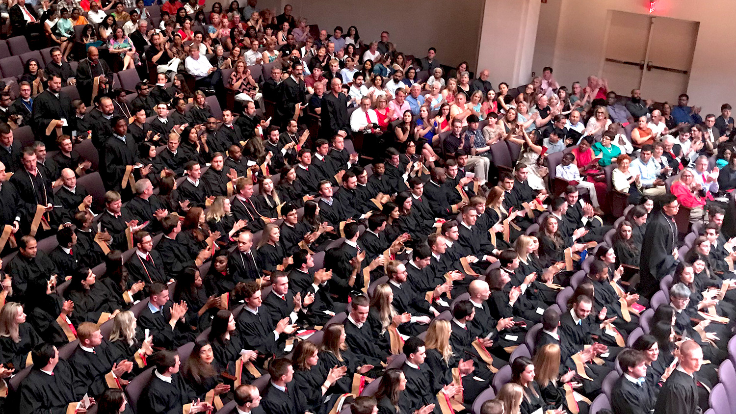 Family and friends join Poole College's Jenkins graduate students for their 2019 Hooding Ceremony at Meymandi Concert Hall in Raleigh.