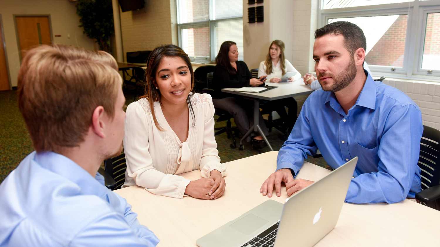 Students meet between sessions to prep for classes.