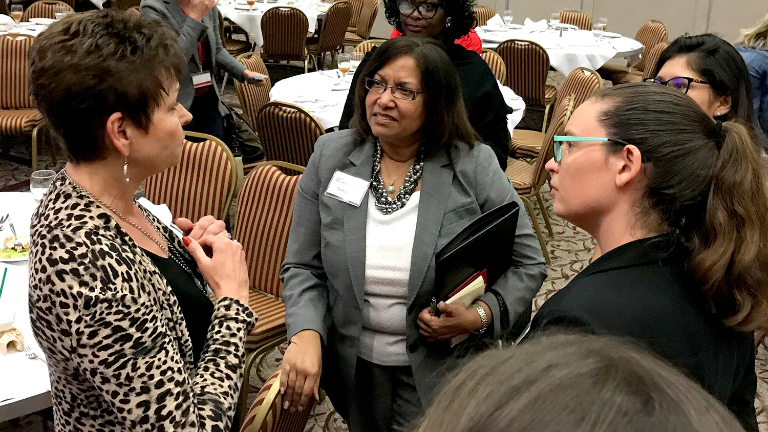 Gina Poole, CMO-gamers, Amazon, speaks with participants at the IWC after her keynote presentation.