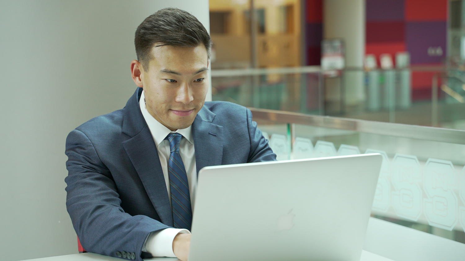 mac student with laptop