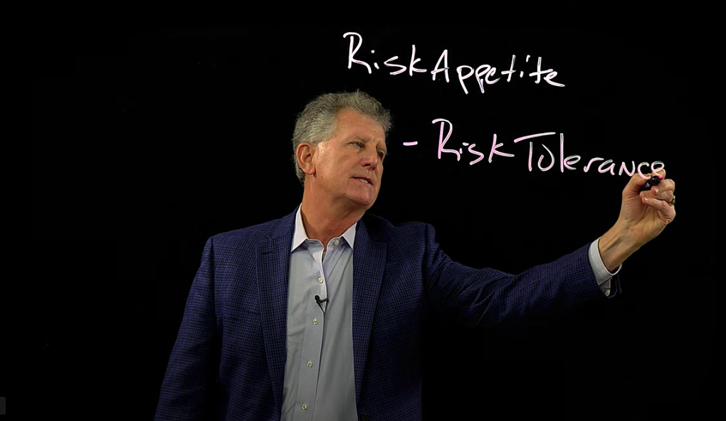 NC State professor lecturing on white board